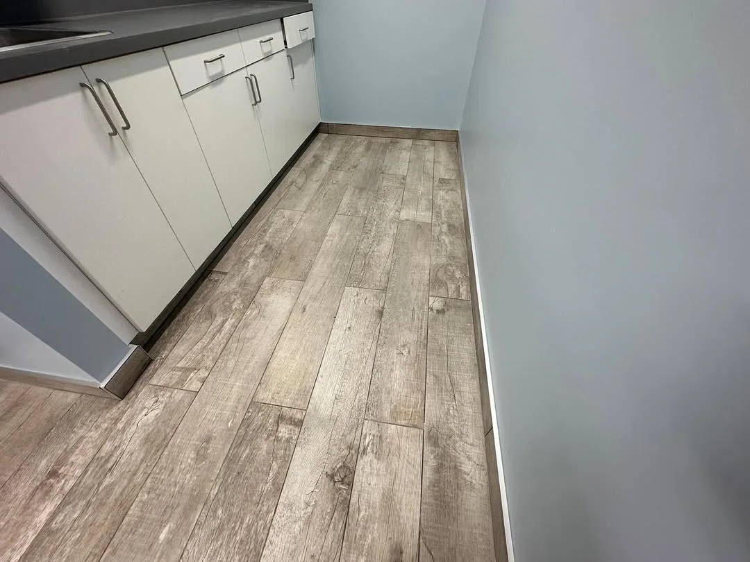 Break-room floor tile — photo 2 of 4
